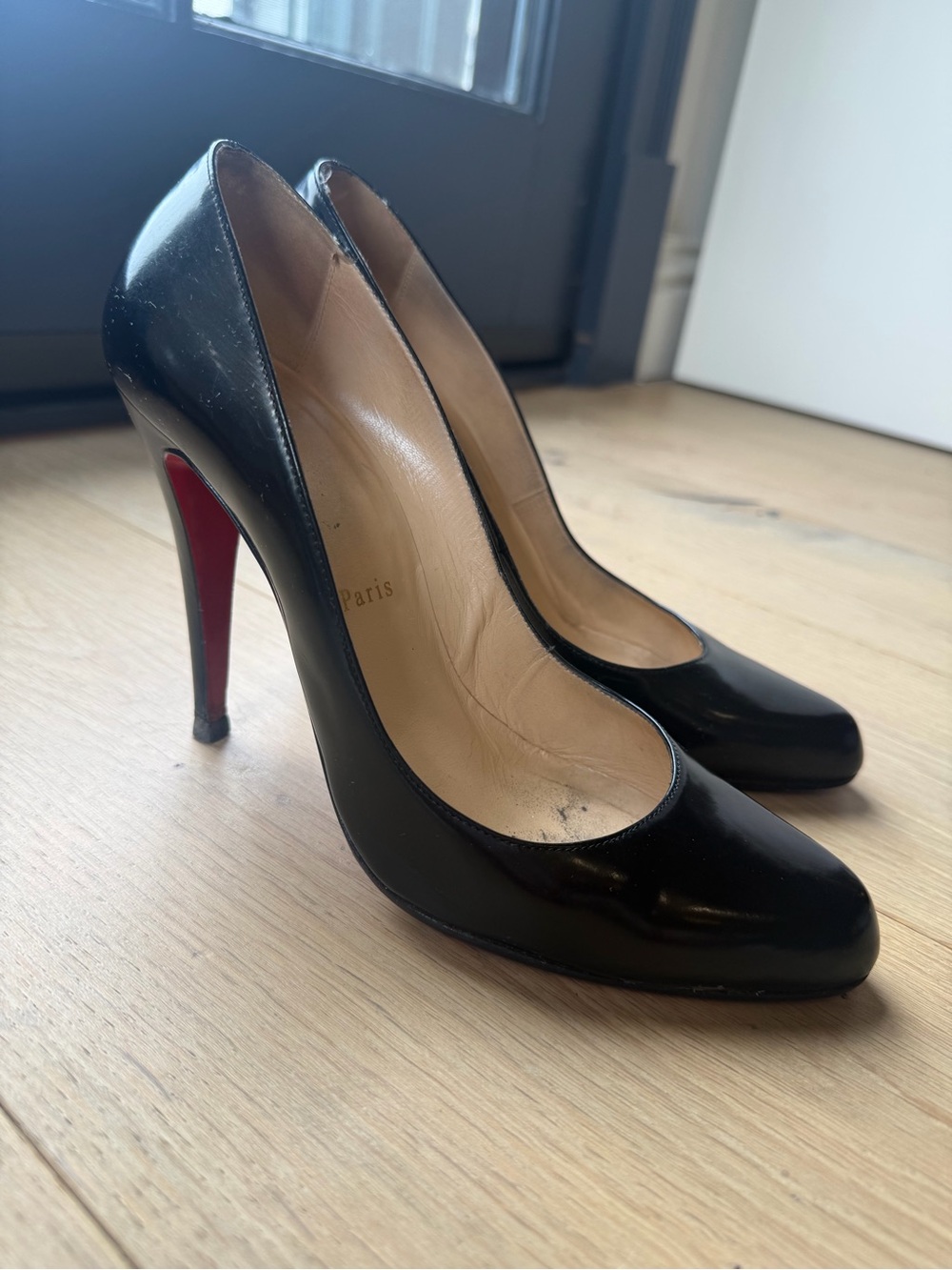 Christian Louboutin Black Patent Pumps with Red Soles